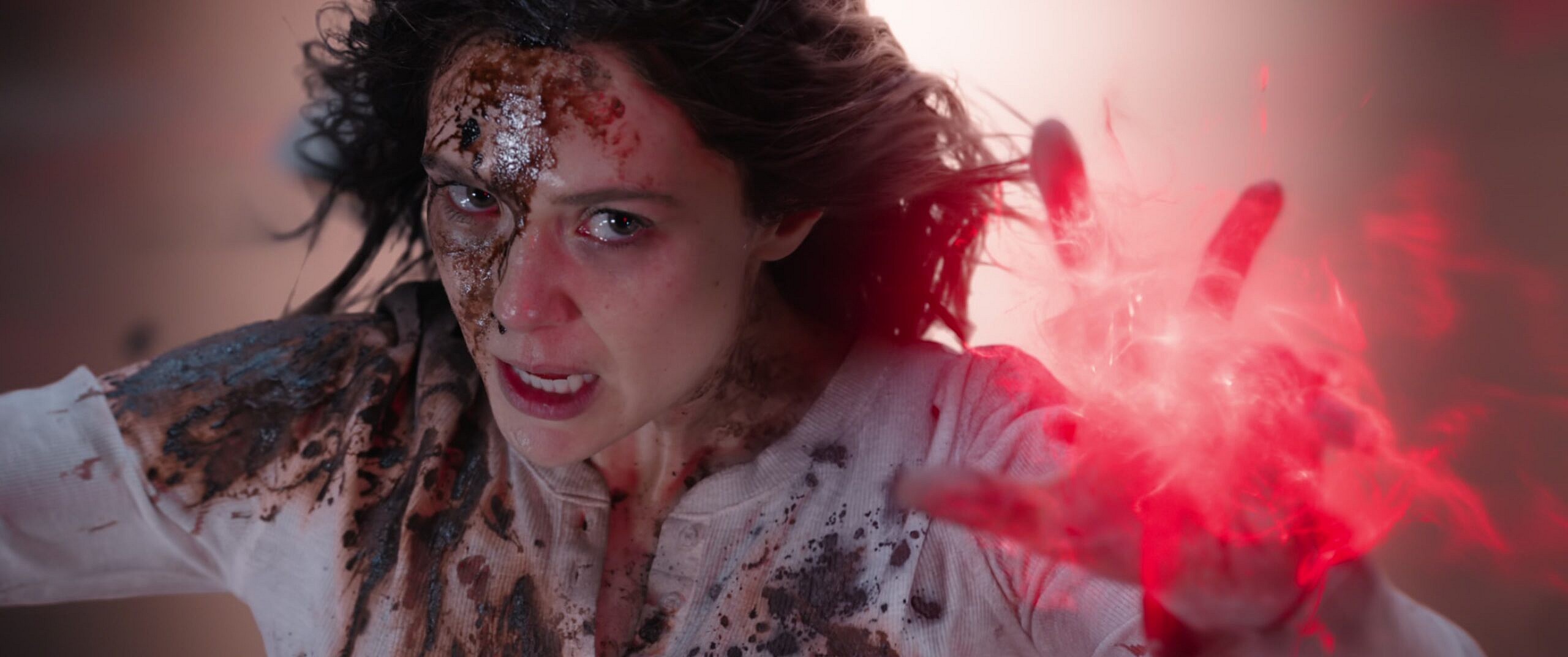 Wanda Maximoff (Elizabeth Olsen) tears through The Illuminati in Doctor Strange and the Multiverse of Madness (2022), Marvel Studios