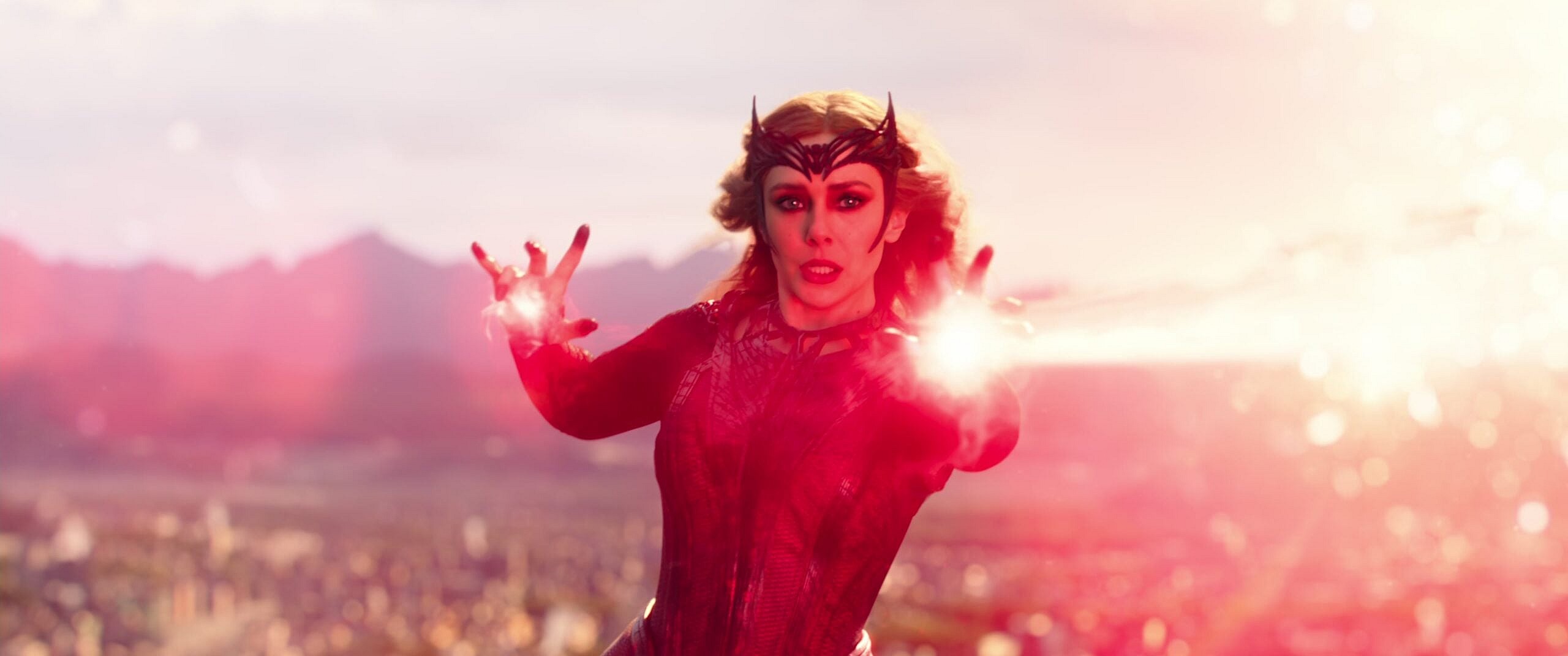 The Scarlet Witch (Elizabeth Olsen) rains her Hex Bolts down upon Kamar Taj in Doctor Strange in the Multiverse of Madness (2022), Marvel Entertainment