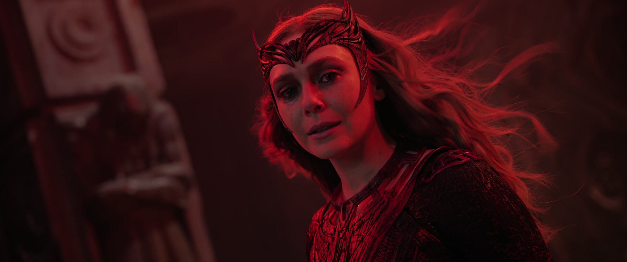 The Scarlet Witch (Elizabeth Olsen) realizes the futility of her pursuits in Doctor Strange in the Multiverse of Madness (2022), Marvel Entertainment