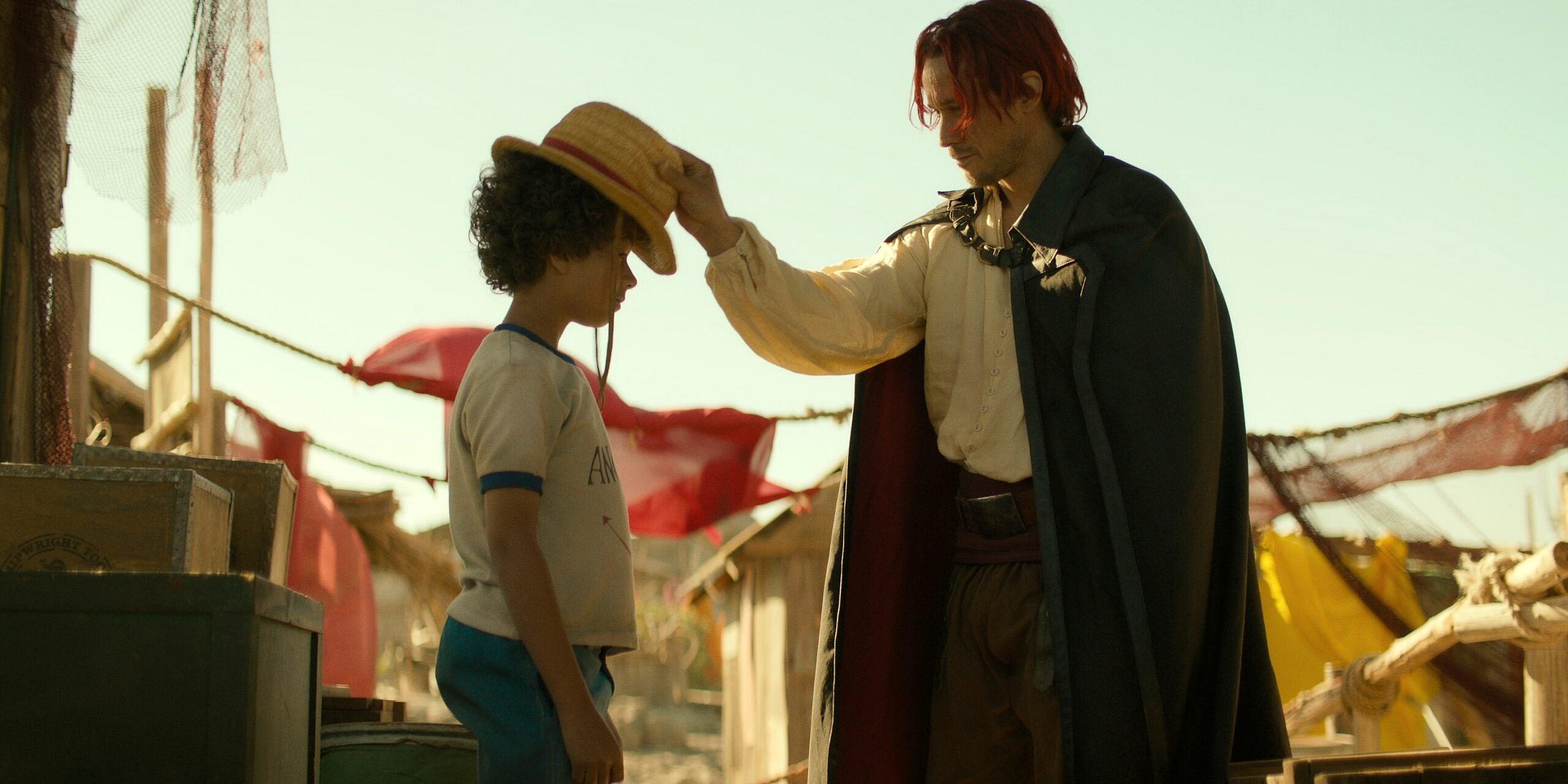 Colton Osorio as Young Luffy, Peter Gadiot as Shanks in One Piece season 1 (2023), Netflix