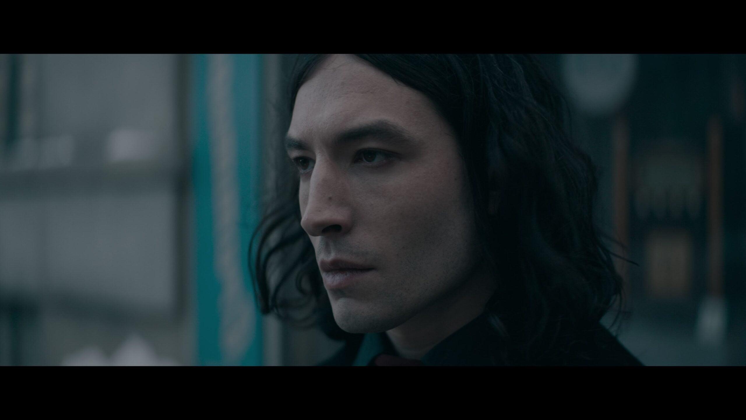 Credence Barebones (Ezra Miller) confronts Dumbeldore (Jude Law) in Fantastic Beasts: The Secrets of Dumbledore (2022), Warner Bros. Pictures