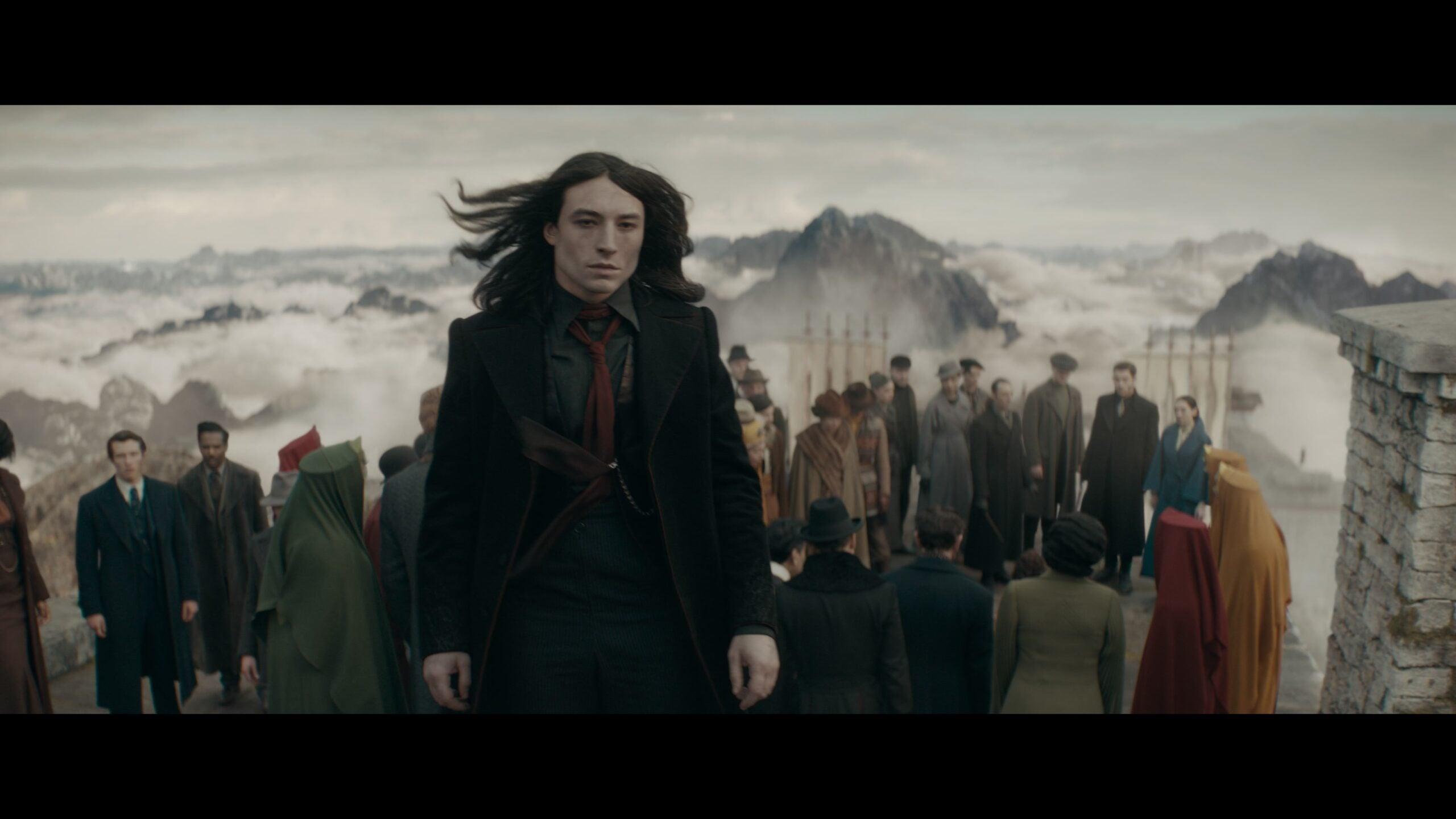 Credence Barebones (Ezra Miller) stands against Gindelwald (Mad’s Mikkelsen) in Fantastic Beasts: The Secrets of Dumbledore (2022), Warner Bros. Pictures