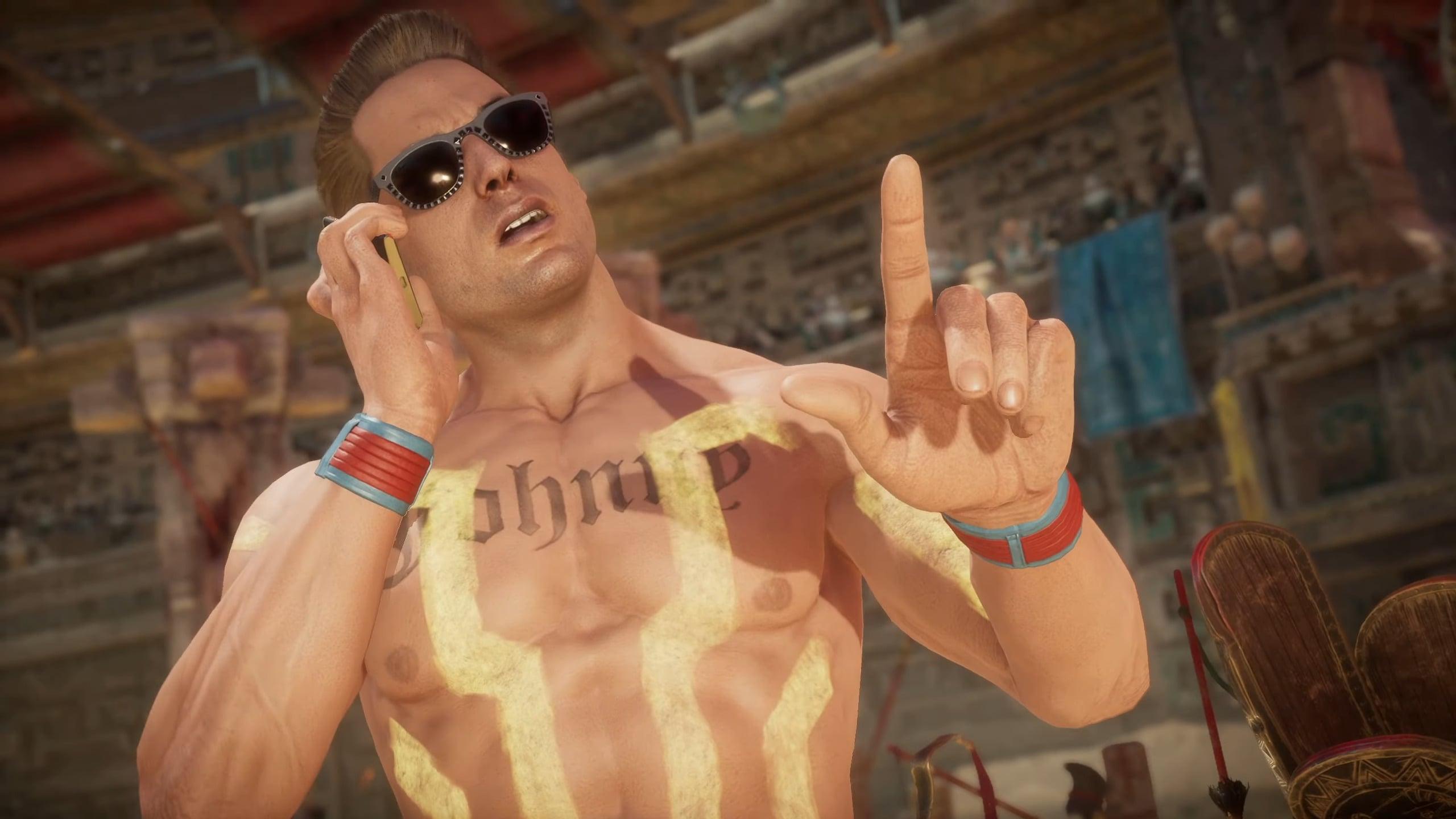 Johnny Cage (Andrew Bowen) takes a call from his agent in Mortal Kombat 11 (2019), NetherRealm Studios