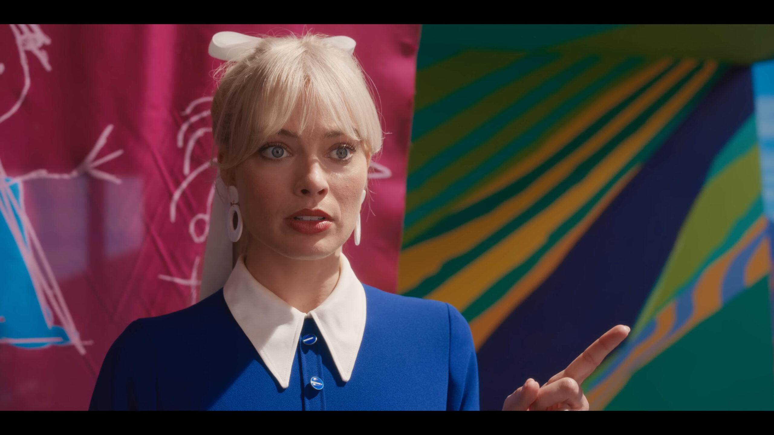 Barbie (Margot Robbie) makes her decision in Barbie (2023), Warner Bros. Pictures