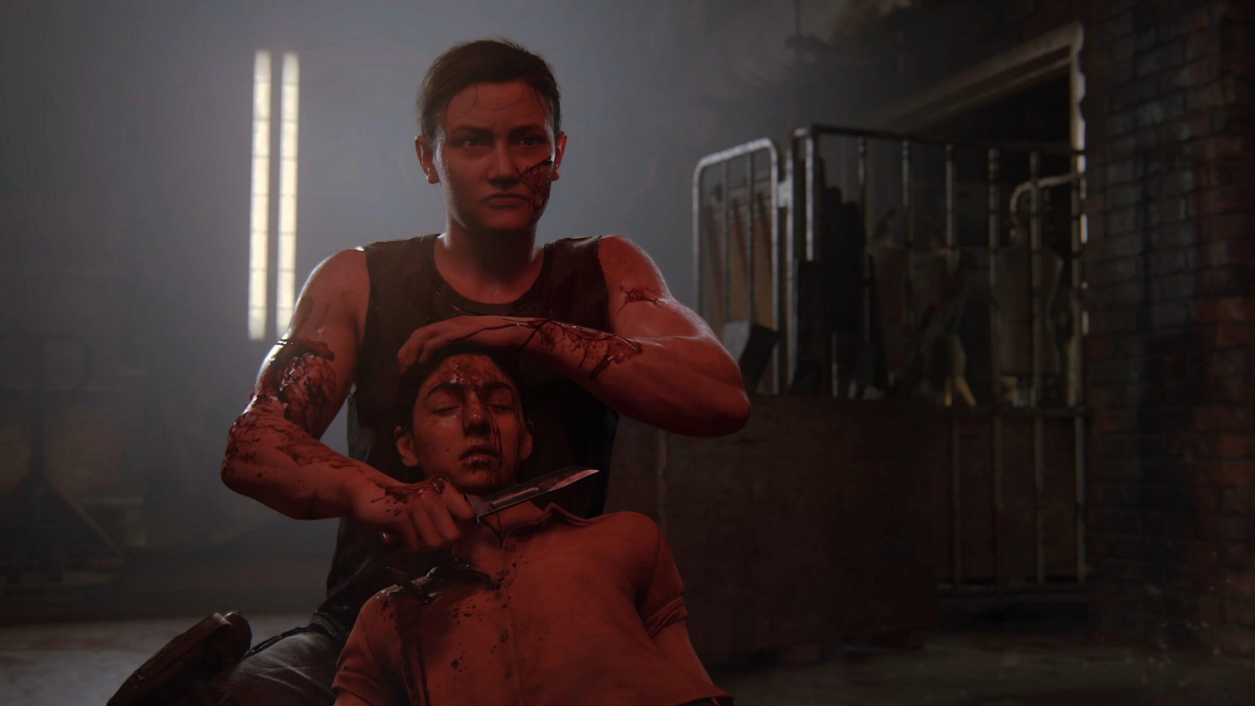 Abby (Laura Bailey) prepares to slit pregnant Dana's (Shannon Woodward) throat in The Last of Us