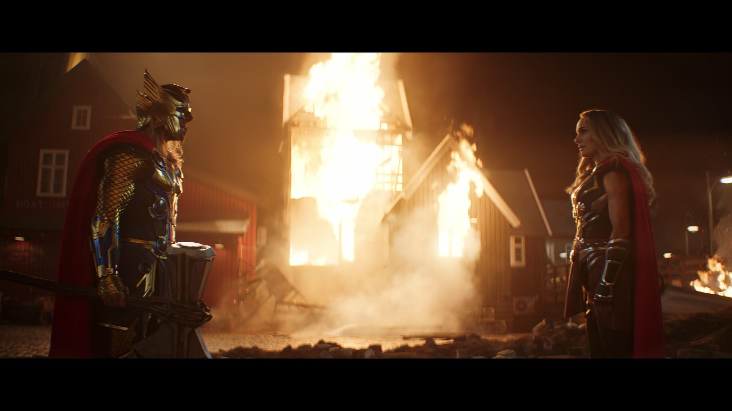 Thor (Chris Hemsworth) discovers Jane Foster (Natalie Portman) is now wielding Mjolnir in Thor: Love and Thunder (2022), Marvel Entertainment