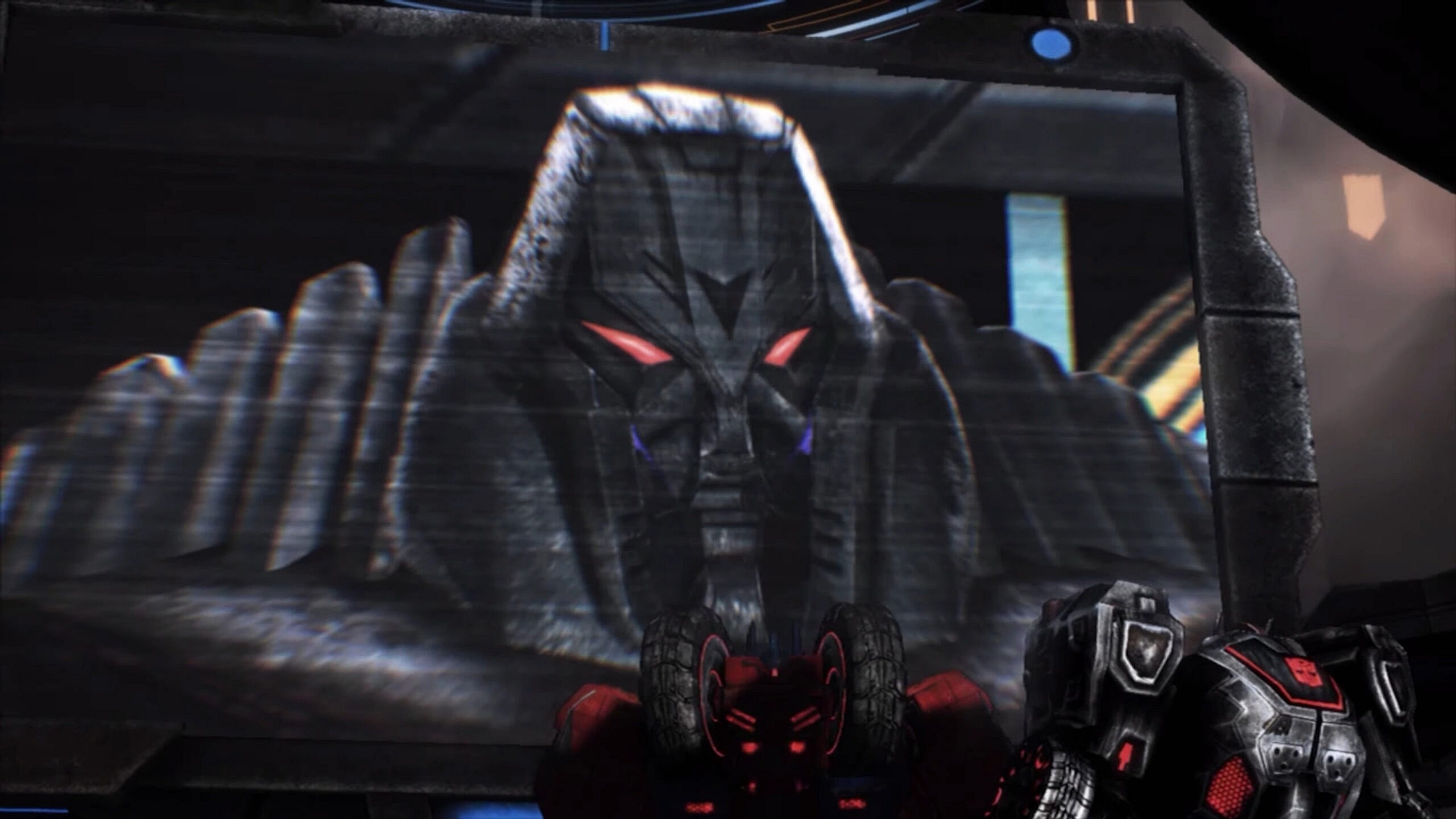 Megatron (Fred Tatasciore) sends an emergency message to the Autobots in Transformers: Fall of Cybertron (2012), Activision