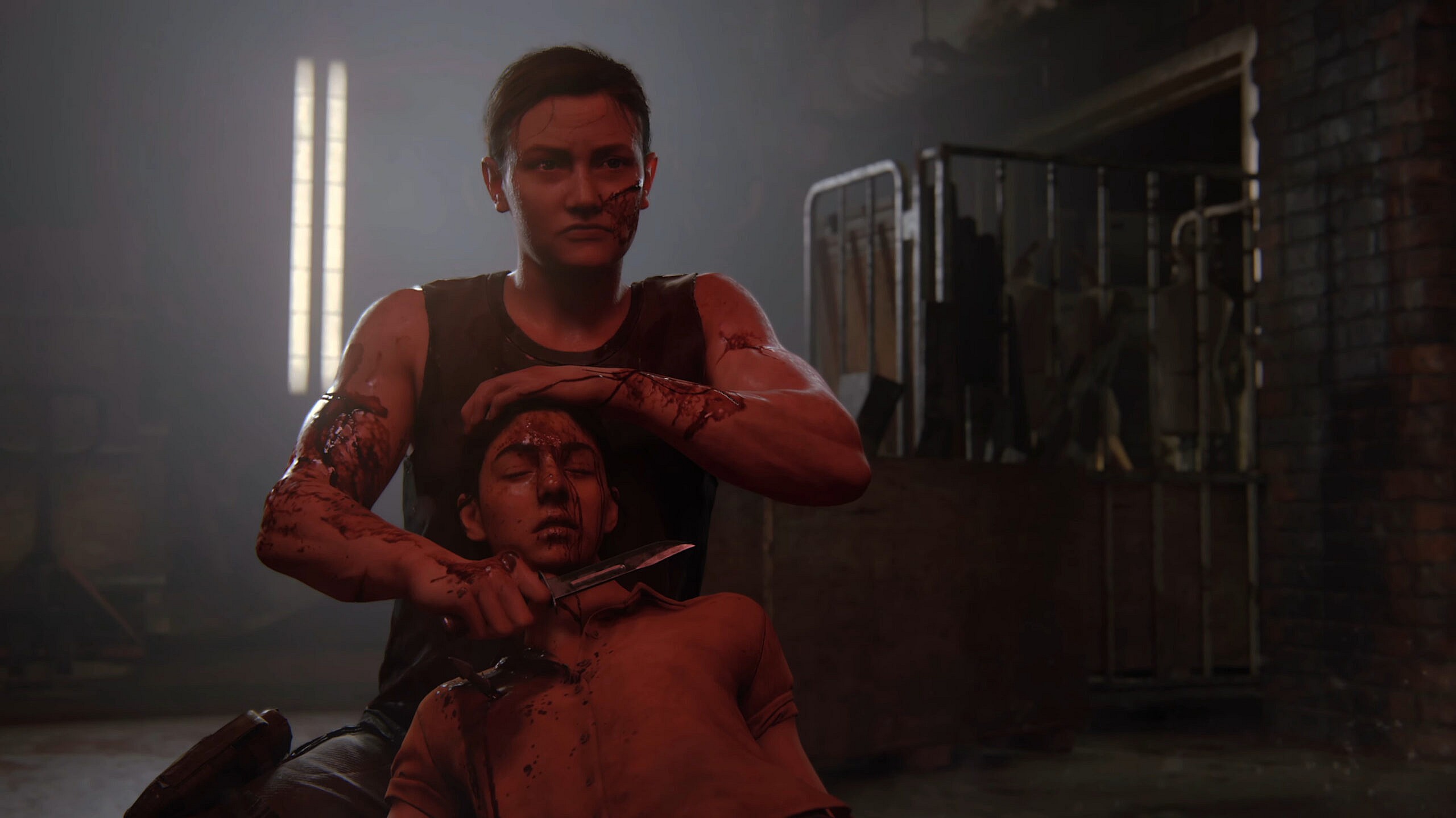 Abby (Laura Bailey) prepares to knowingly slit a pregnant Dana's (Shannon Woodward) throat in The Last of Us Part II (2020), Naughty Dog