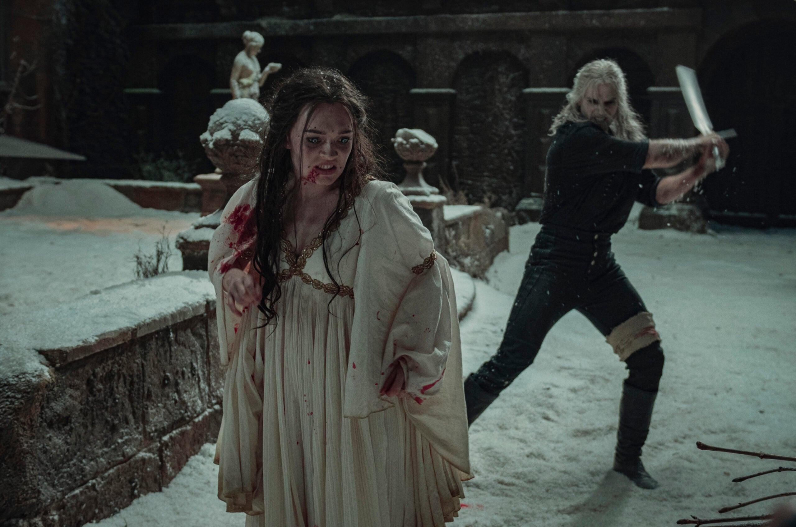 Geralt (Henry Cavill) takes a swing at the bruxa Vereena (Agnes Born) in The Witcher Season 2 Episode 1 “A Grain of Truth” (2021) via Netflix