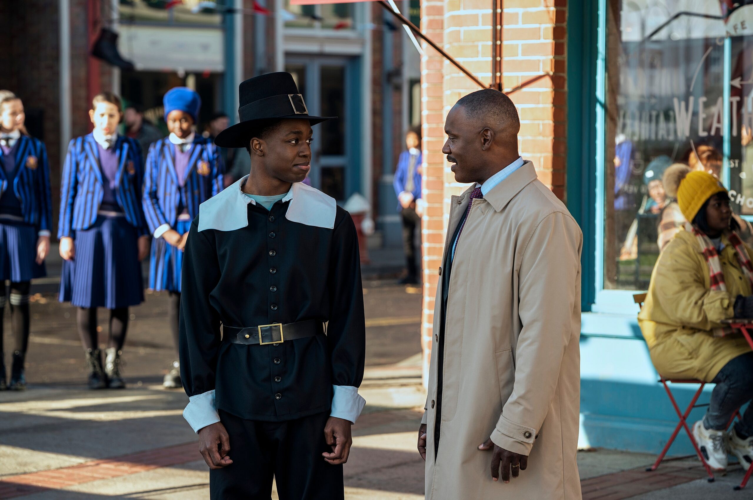 Wednesday. (L to R) Iman Marson as Lucas Walker, Tommie Earl Jenkins as Mayor Walker in episode 103 of Wednesday. Cr. Vlad Cioplea/Netflix © 2022