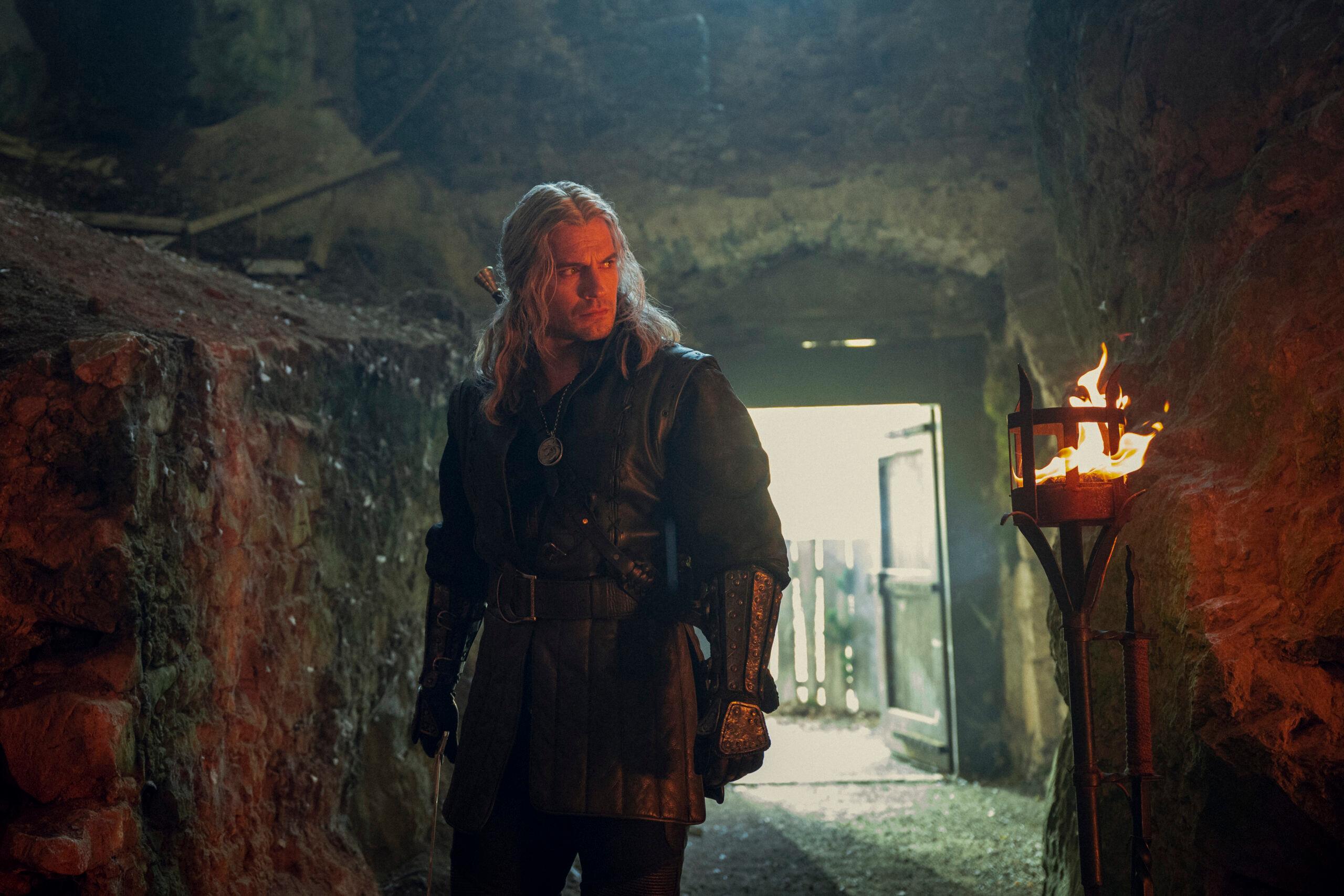 Geralt (Henry Cavill) scouts out the area in The Witcher Season 3 Episode 2 "Unbound"" (2023), Netflix