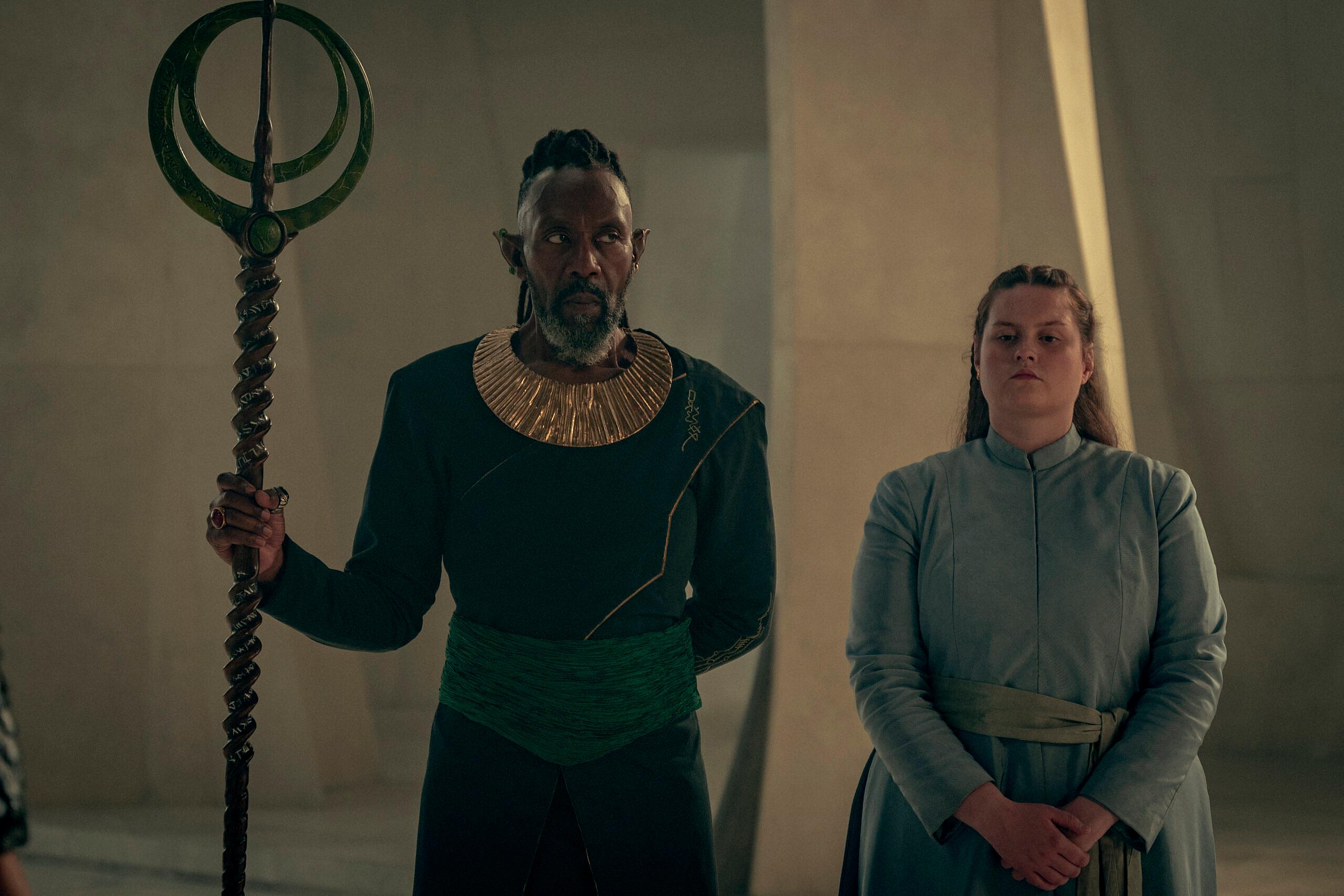 Lenny Henry as Chief David Balor, Amy Murray as Fenrik in The Witcher: Blood Origin (2022), Netflix