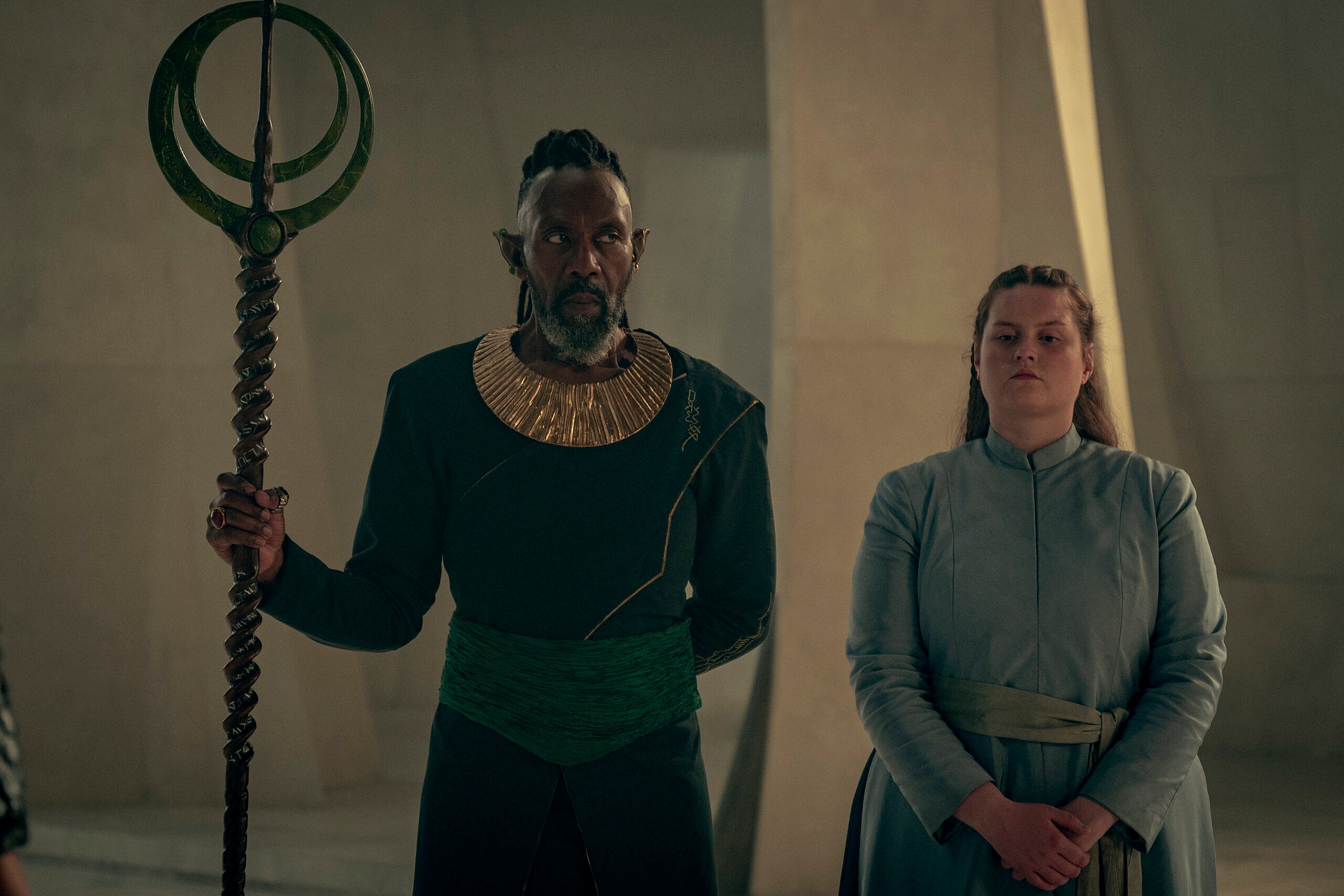 Lenny Henry as Chief David Balor, Amy Murray as Fenrik in The Witcher: Blood Origin (2022) via Netflix