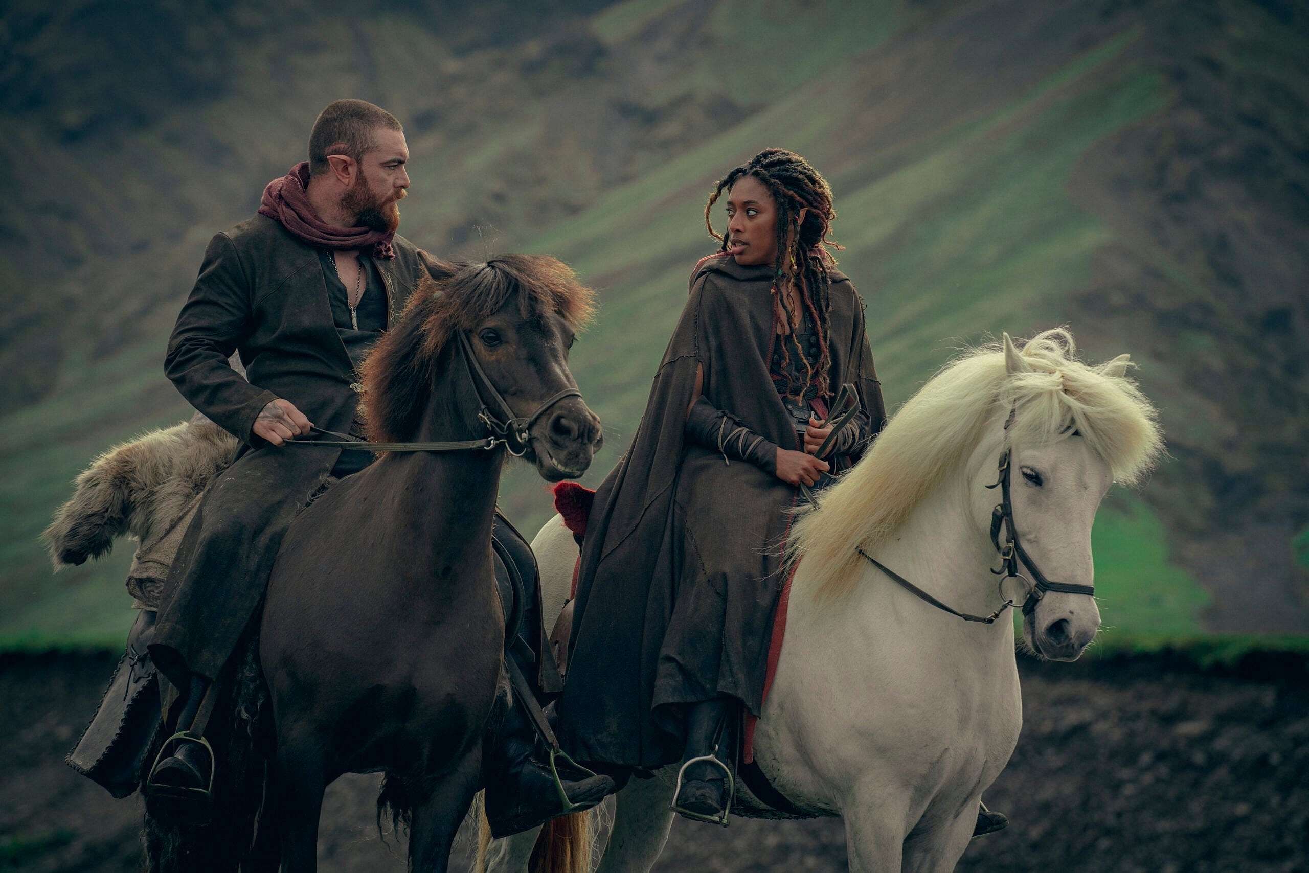 Sophia Brown as Éile and Laurence O'Fuarain as Fjall in The Witcher: Blood Origin (2022) via Netflix
