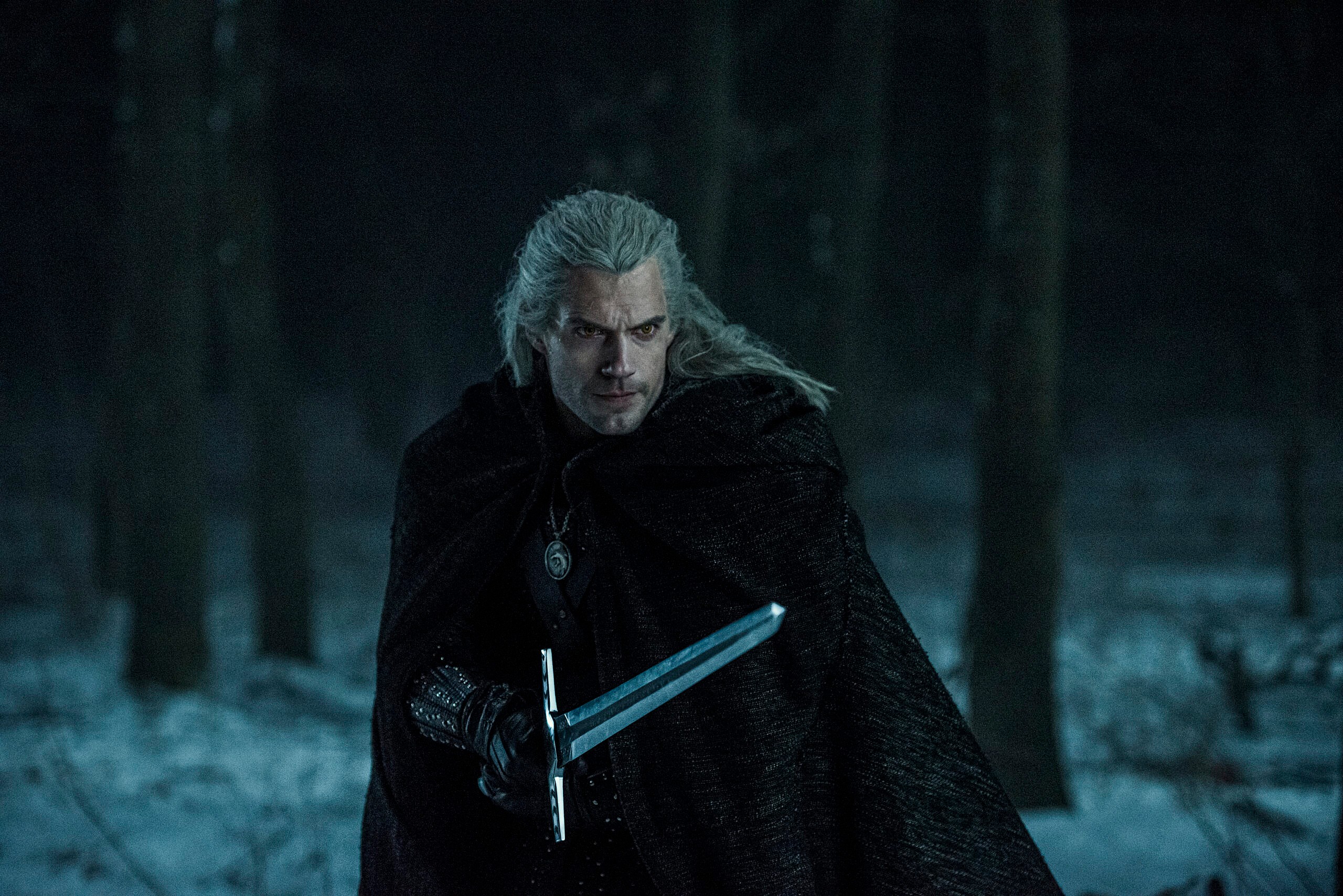Geralt (Henry Cavill) draws his steel sword in The Witcher Season 1 Episode 4 “Of Banquets, Bastards, and Burials” (2019), Netflix