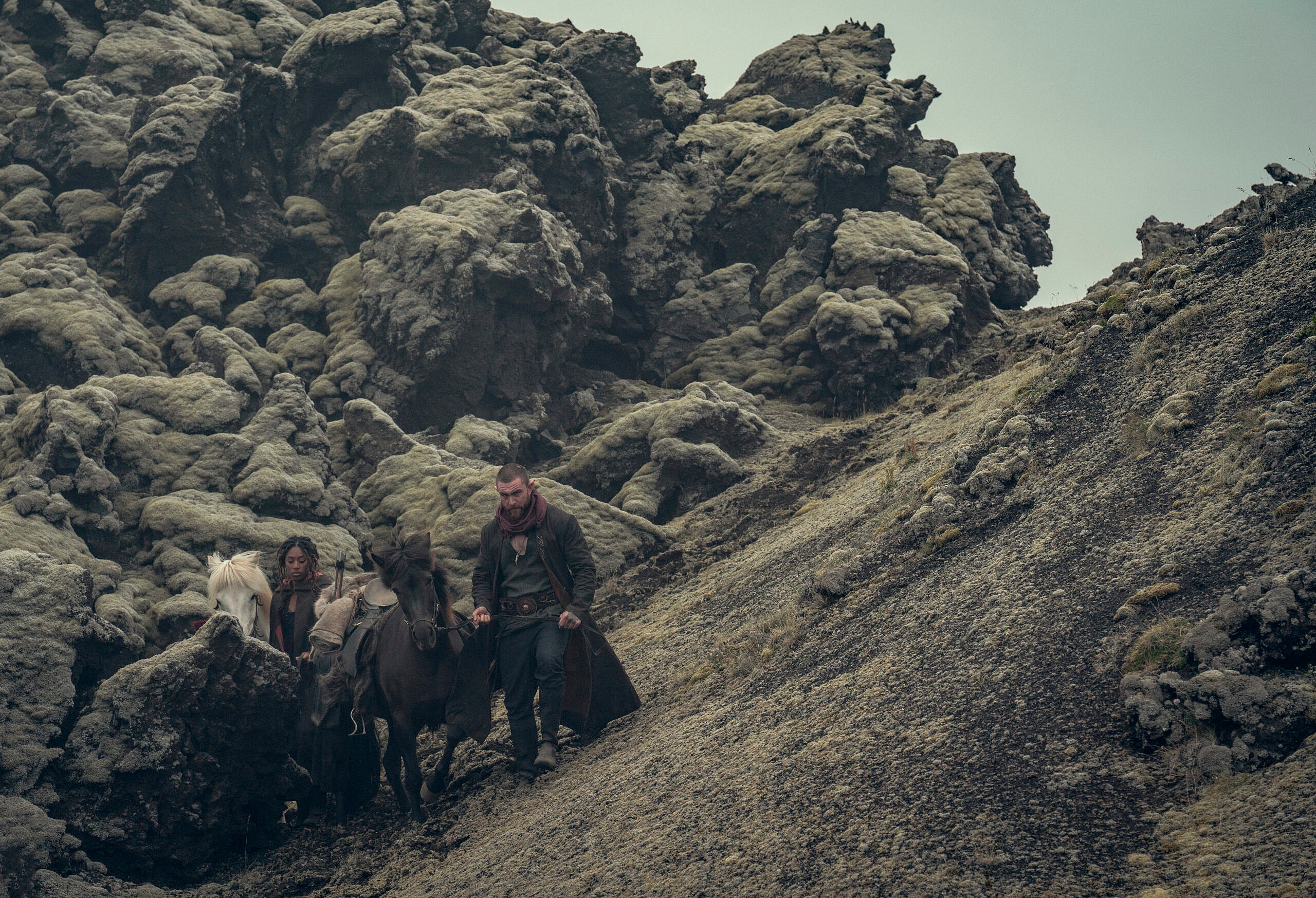 Sophia Brown as Éile and Laurence O'Fuarain as Fjall in The Witcher: Blood Origin (2022) via Netflix