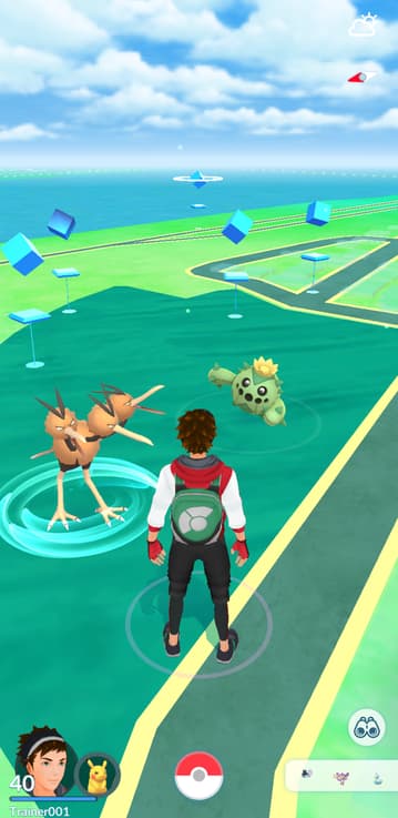 A player approaches a wild Dodrio and Cacnea in Pokémon Go (2016), Niantic
