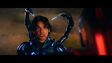 Jamie Reyes (Xolo Maridueña) confronts Carapax (Raoul Max Trujillo) in Blue Beetle (2023), DC