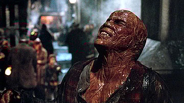 Al Simmons (Michael Jai White) looks up for a sign from Heaven in Spawn (1997), New Line Cinema