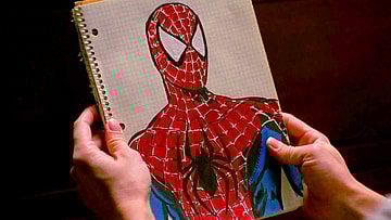 Peter Parker (Tobey Maguire) finalizes his webs in Spider-Man (2002), Sony