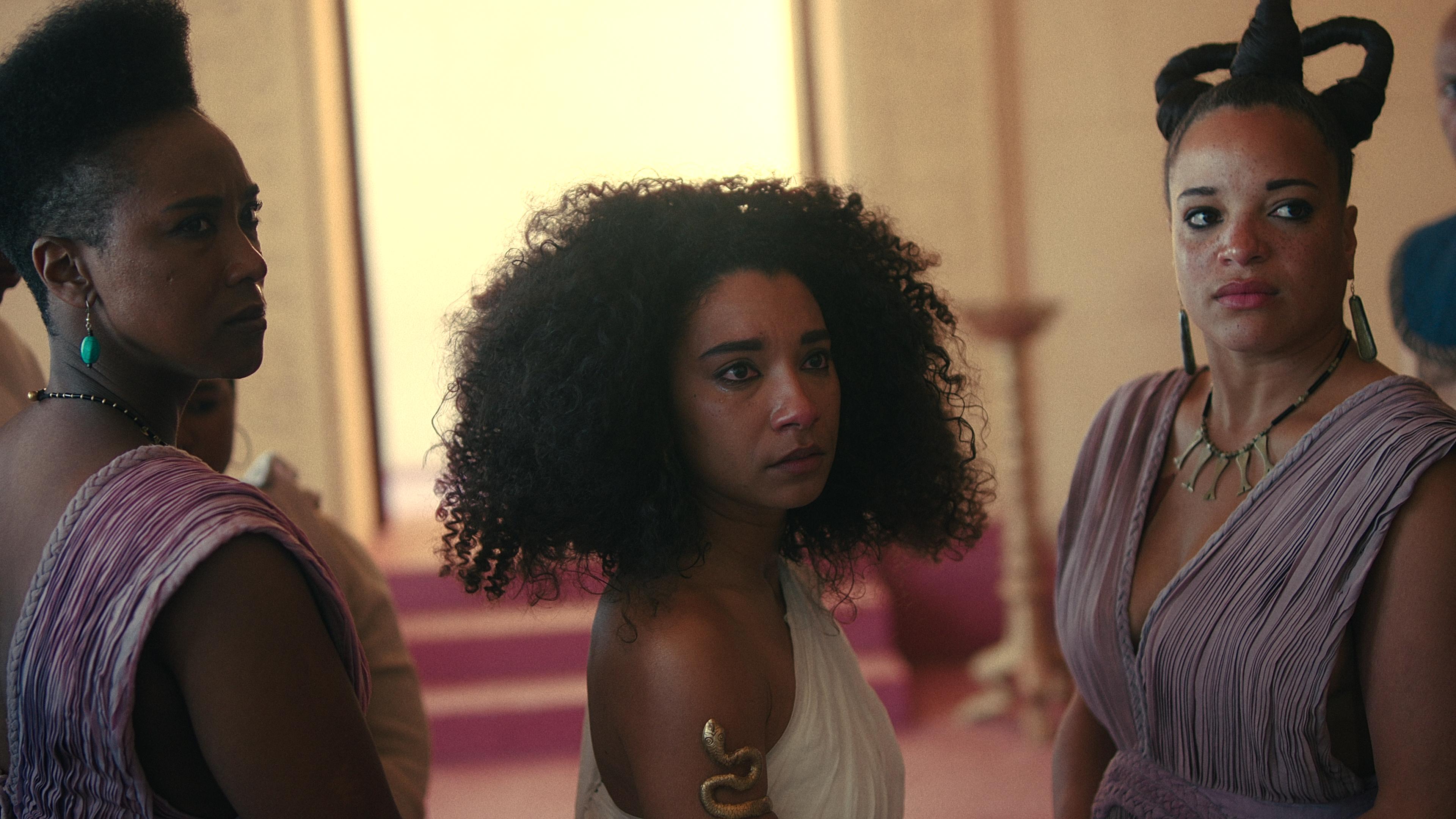Cleopatra (Adele James) attended to by her hand maidens in Queen Cleopatra (2023), Netflix