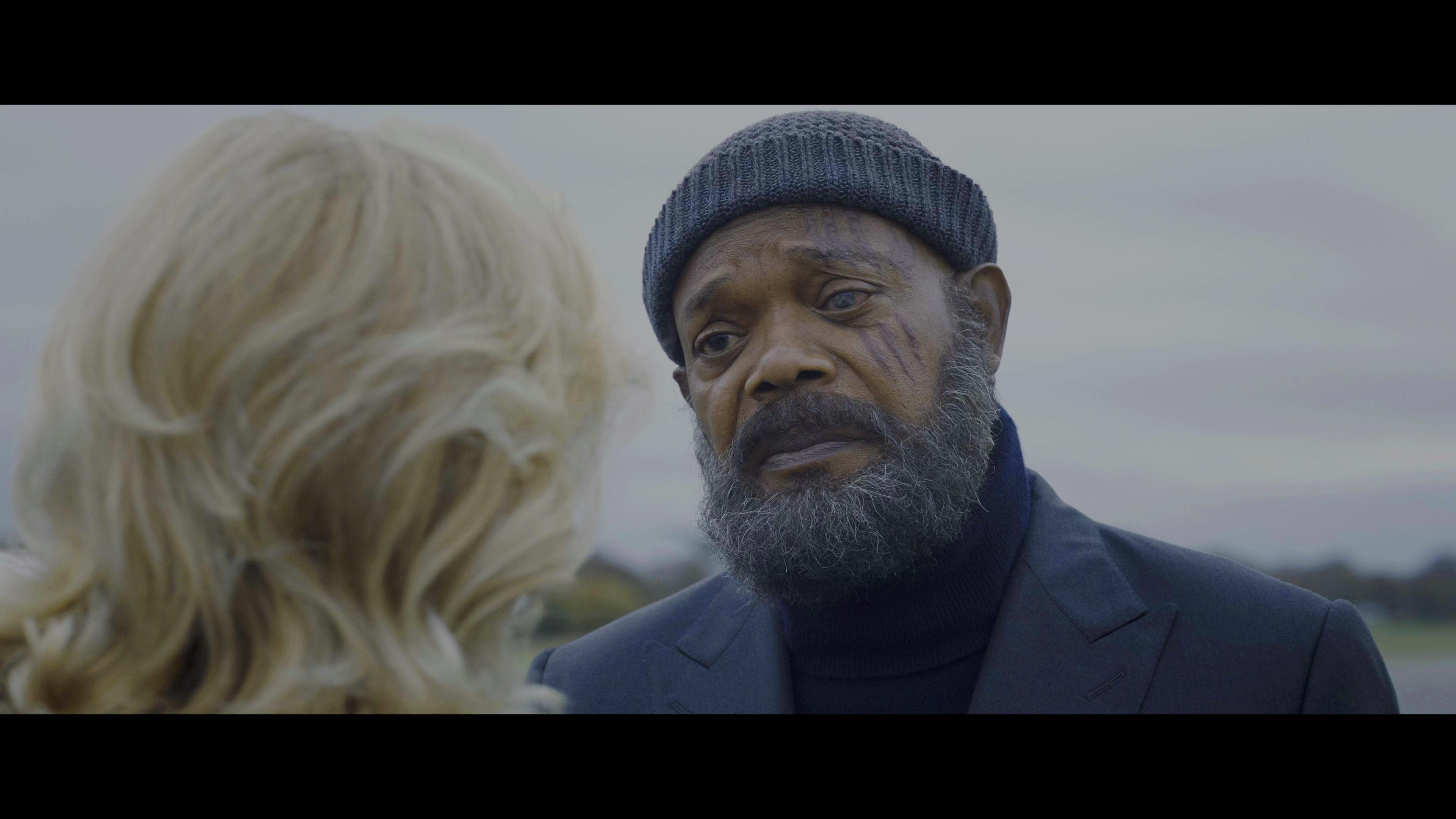 Nick Fury (Samuel L. Jackson) offers condolences to Elizabeth Hill (Juliet Stevenson) in Secret