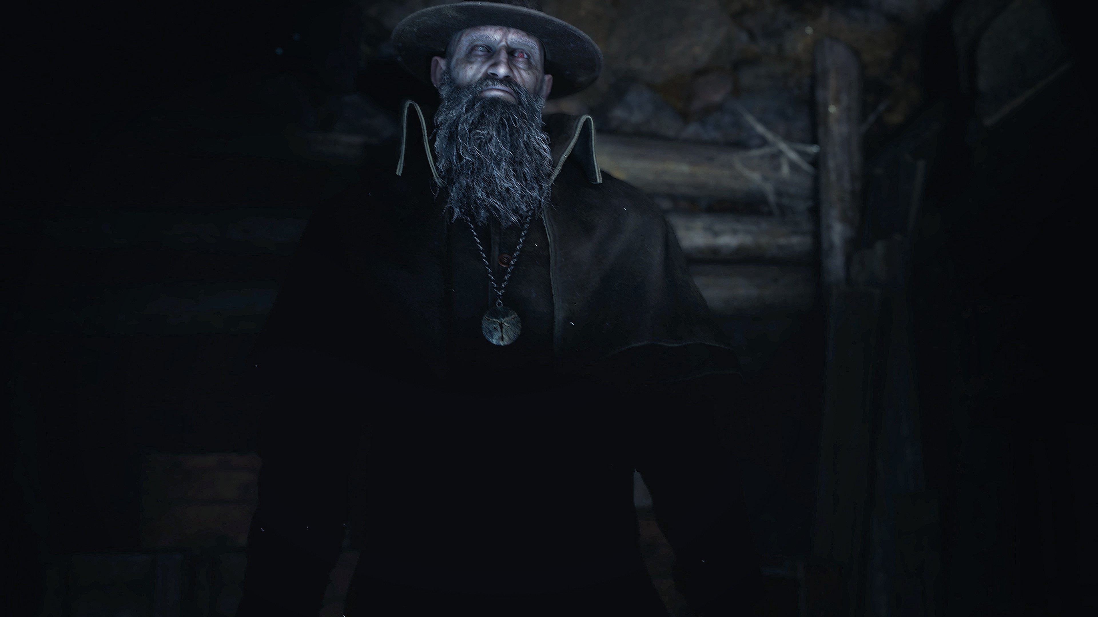 Father Bitores Méndez (Jon Bryant) towers above in the darkness via Resident Evil 4 (2023), Capcom