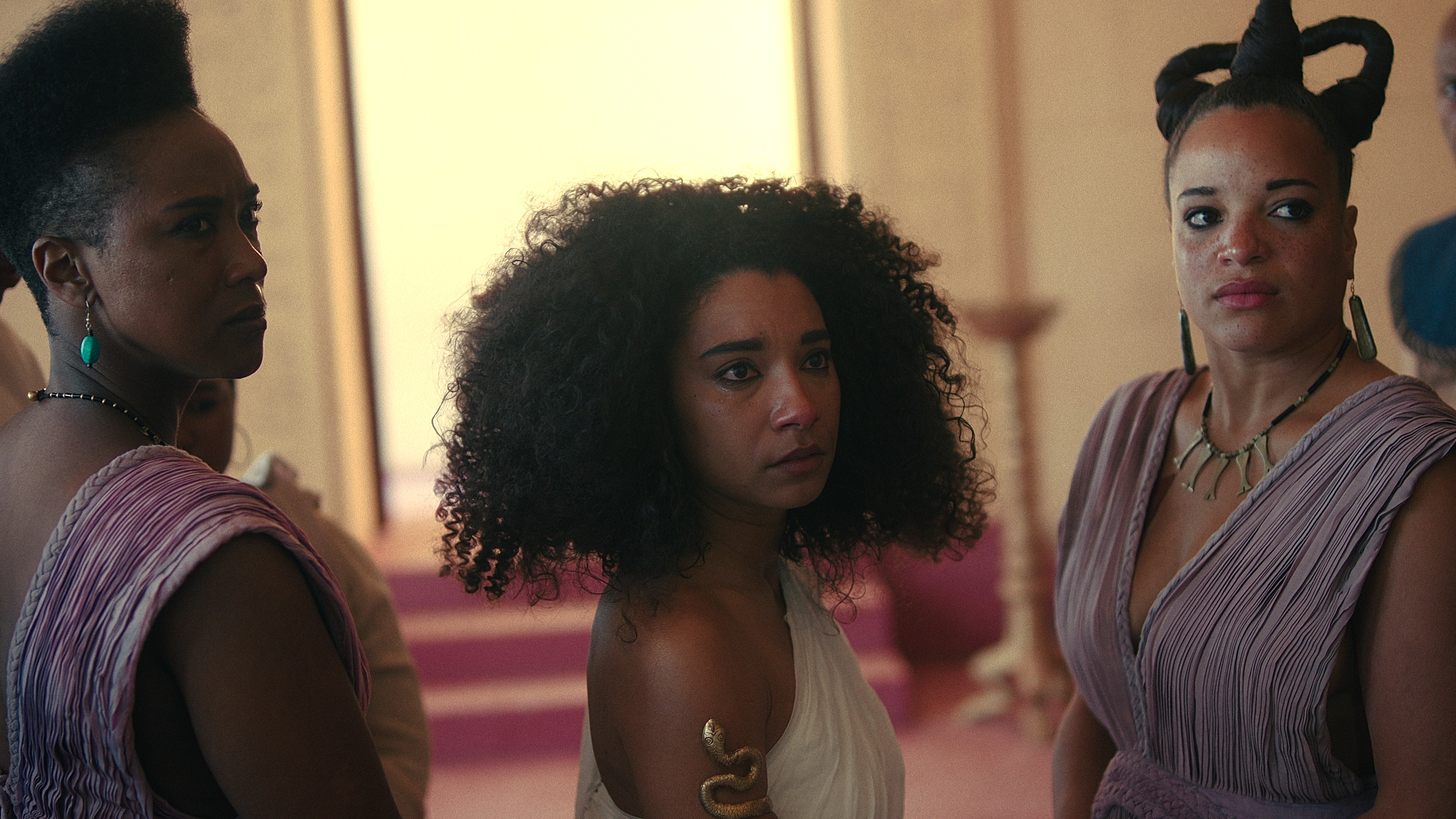 Cleopatra (Adele James) attended to by her hand maidens in Queen Cleopatra (2023), Netflix