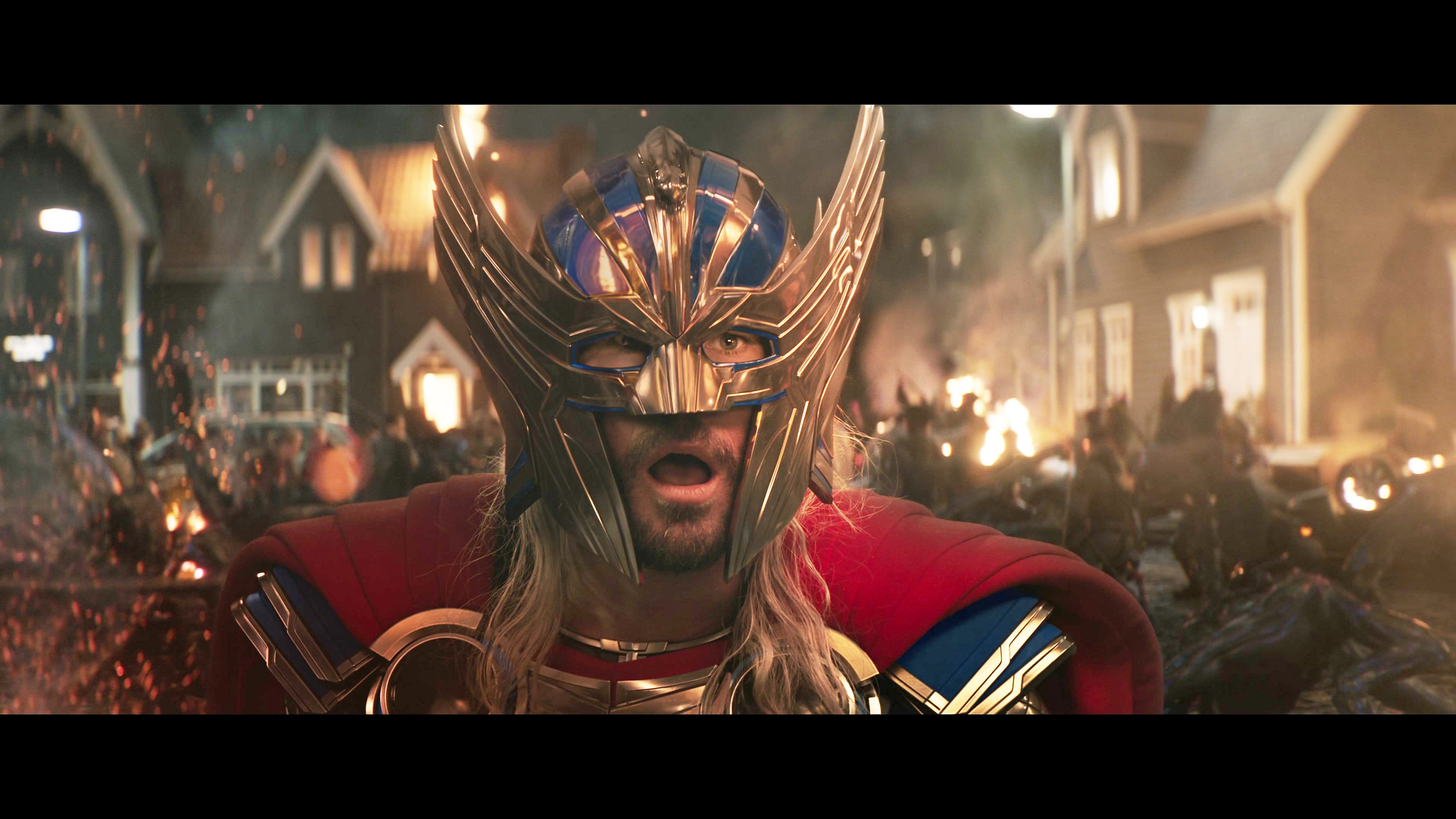 Thor (Chris Hemsworth) is shocked to discover the identity of Mjolnir's new wielder in Thor: Love and Thunder (2022), Marvel Entertainment.