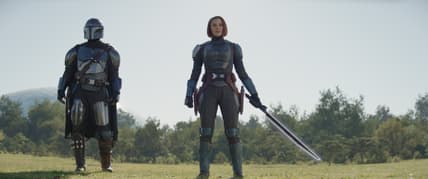 (L-R): Din Djarin (Pedro Pascal) and Bo-Katan Kryze (Katee Sackhoff) with the Darksaber in Lucasfilm's THE MANDALORIAN, season three, exclusively on Disney+. ©2023 Lucasfilm Ltd. & TM. All Rights Reserved.