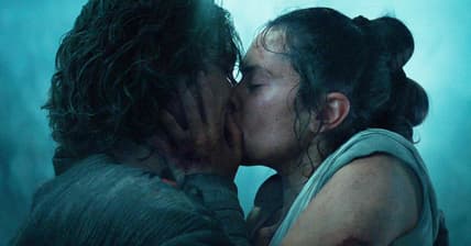 Rey (Daisy Ridley) shares her first and last kiss with Kylo Ren (Adam Driver) in Star Wars: Episode IX - The Rise of Skywalker (2019), Disney