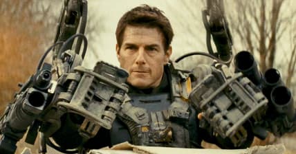 Major Cage (Tom Cruise) guns down an attacking Mimic in Edge of Tomorrow (2014), Warner Bros. Pictures