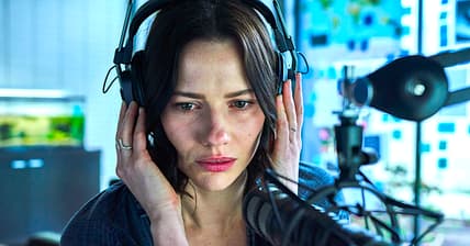 Lily Sullivan as The Interviewer in the Sci-Fi/Thriller film, MONOLITH, a Well Go USA release. Photo courtesy of Well Go USA. 