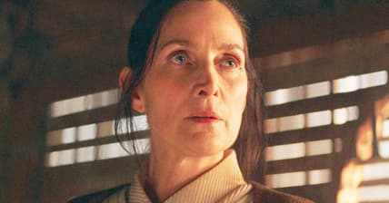Jedi Master Indara (Carrie-Anne Moss) prepares to defend herself from Mae (Amandla Stenberg) in The Acolyte Season 1 Episode 1 "Lost/Found" (2024), Disney