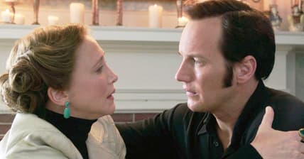 Lorraine Warren (Vera Farmiga) warns Ed (Patrick Wilson) of their next mission in The Conjuring 2 (2016), New Line Cinema