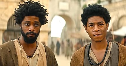 LaKeith Stanfield as Clarence and RJ Cyler as Elijah in The Book of Clarence (2023)