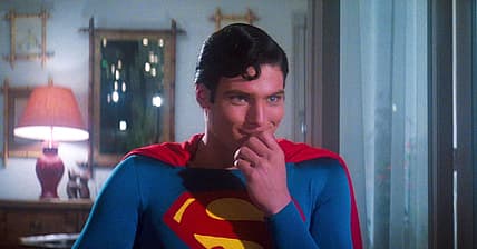 Superman (Christopher Reeve) is amused by Lois (Margot Kidder) in Superman: The Movie (1978)