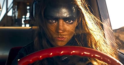 Furiosa gets behind the wheel of a War Rig in Furiosa: A Mad Max Saga (2024)