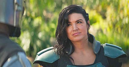 Din Djarin (Pedro Pascal) and Cara Dune (Gina Carano) catch their breath in The Mandalorian Season