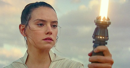 Rey (Daisy Ridley) ignites her lightsaber in Star Wars: Episode IX - The Rise of Skywalker (2019), Disney