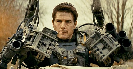 Major Cage (Tom Cruise) guns down an attacking Mimic in Edge of Tomorrow (2014), Warner Bros. Pictures