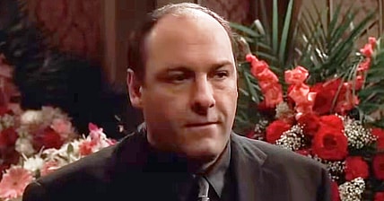 Tony (James Gandolfini) attends the funeral of his grandfather Thomas Giglione Sr. (N/A) in The Sopranos Season 2 Episode 6 "The Happy Wanderer" (2000), HBO