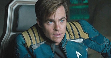 Captain Kirk (Chris Pine) takes a breather after crash landing the U.S.S. Enterprise in Star Trek Beyond (2016), Paramount Pictures