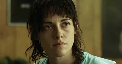 Lou (Kristen Stewart) meets a customer in Love Lies Bleeding (2024), A24