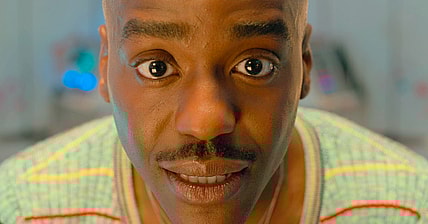 The Doctor (Ncuti Gatwa) makes the call to save the babies of Space Station Beta in Doctor Who Series 14 Episode 1 "Space Babies" (2024), BBC