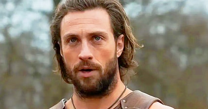 Kraven (Aaron Taylor-Johnson) taunts a group of poachers in Kraven the Hunter (2023), Sony Pictures