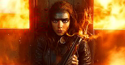 Furiosa (Anya Taylor-Joy) takes cover in Furiosa: A Mad Max Saga (2024), Warner Bros. Pictures