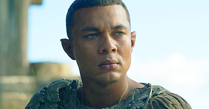 Arondir (Ismael Cruz Cordova) bears his heart to Bronwynin (Nazanin Boniadi) in The Lord of the Rings: The Rings of Power Season 1 Episode 6 "Udûn" (2022), Amazon Studios.