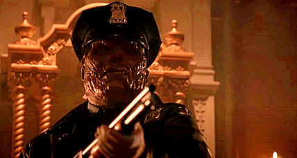 Undead cop (Robert Z'Dar) rides shotgun in Maniac Cop 3: Badge of Silence (1992), First Look Films