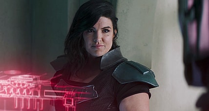 Cara Dune (Gina Carano) agrees to offer her help to the titular hero (Pedro Pascal) in The Mandalorian Season 2 Episode 4 "Chapter 12 - The Siege" (2020), Disney